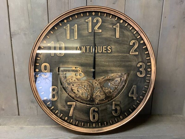 Klok met draaiende radars brons