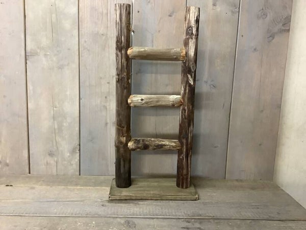 Houten trapje op voet