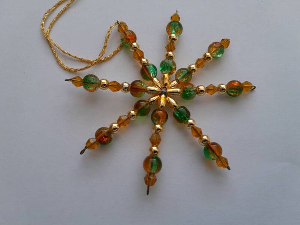 Perlenstern "braun grün gold"   cs686