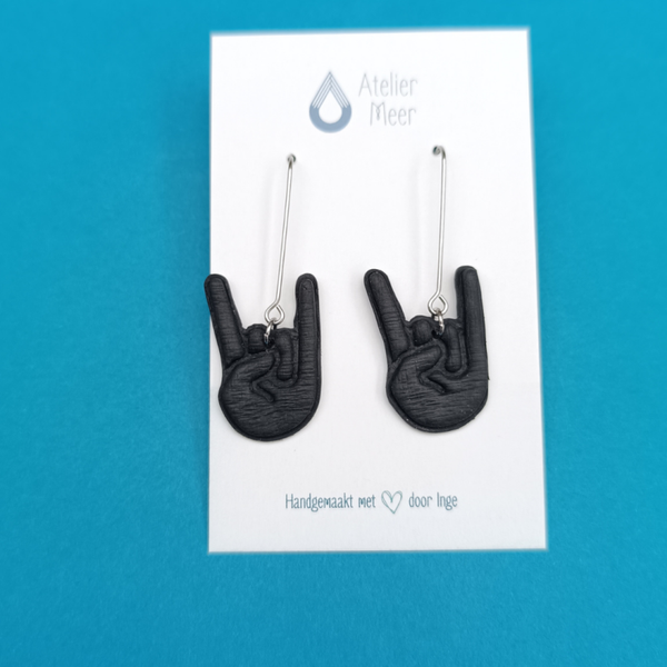 Zwarte Graspop oorbellen | metal rock hand (medium)