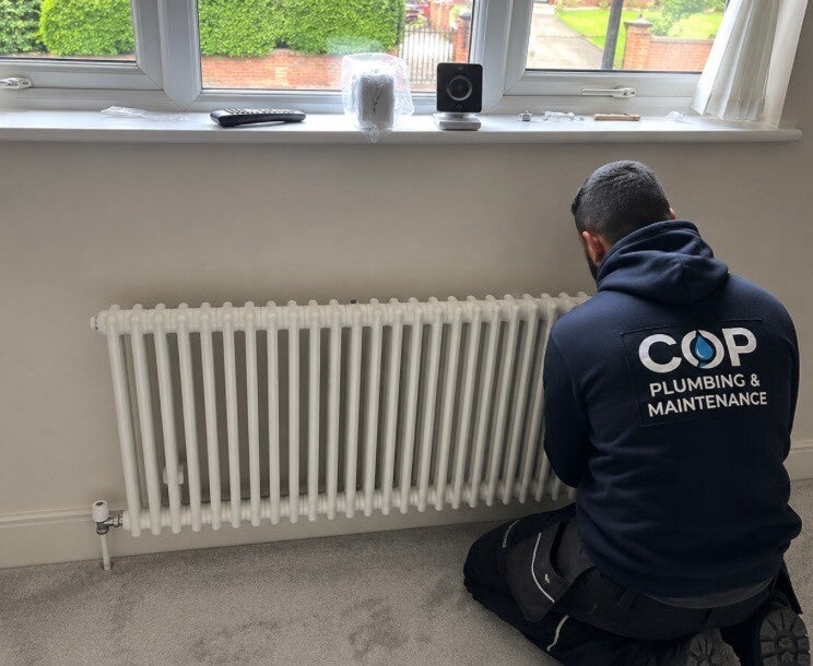 Plumber in Sheffield fixing a burst pipe as part of a 24/7 emergency callout