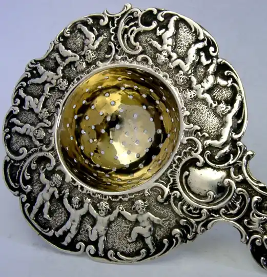 BEAUTIFUL HANAU STERLING SILVER TEA STRAINER CHERUBS c19100-1910 ANTIQUE 58g