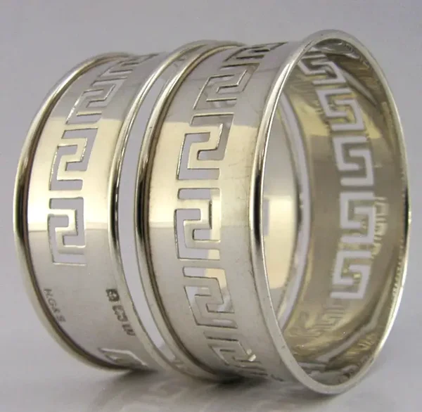 TWO GREEK KEY STERLING SILVER PIERCED NAPKIN RINGS 1928 ANTIQUE 20g