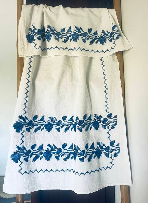 Neat little curtain in white and blue