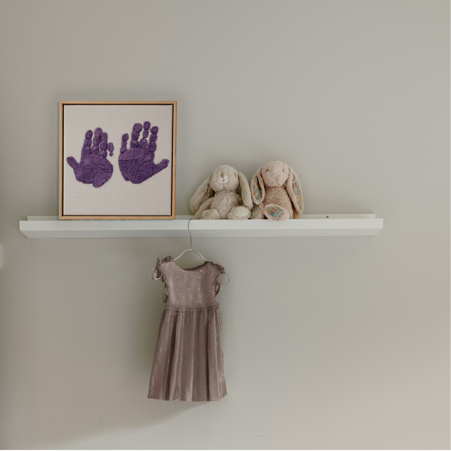 Custom handmade punch needle handprint art in a floating wood frame for nursery wall decor in Malta.