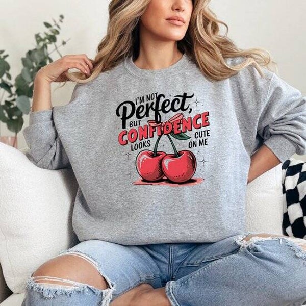 Grijze dames sweater- kersen- sweater met tekst opdruk