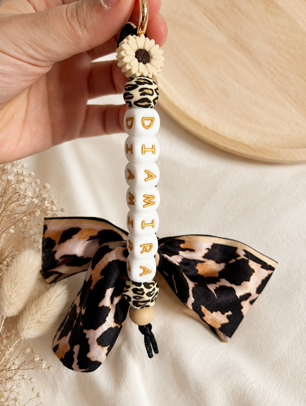 Sleutelhanger en tassenhanger met naam ‘Wild bloom’