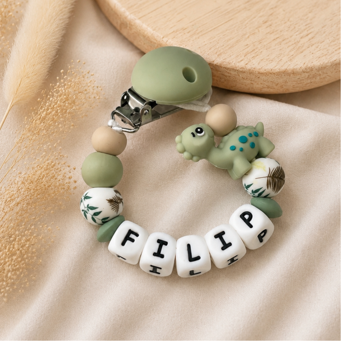 Speenkoord met naam 'Little dino'
