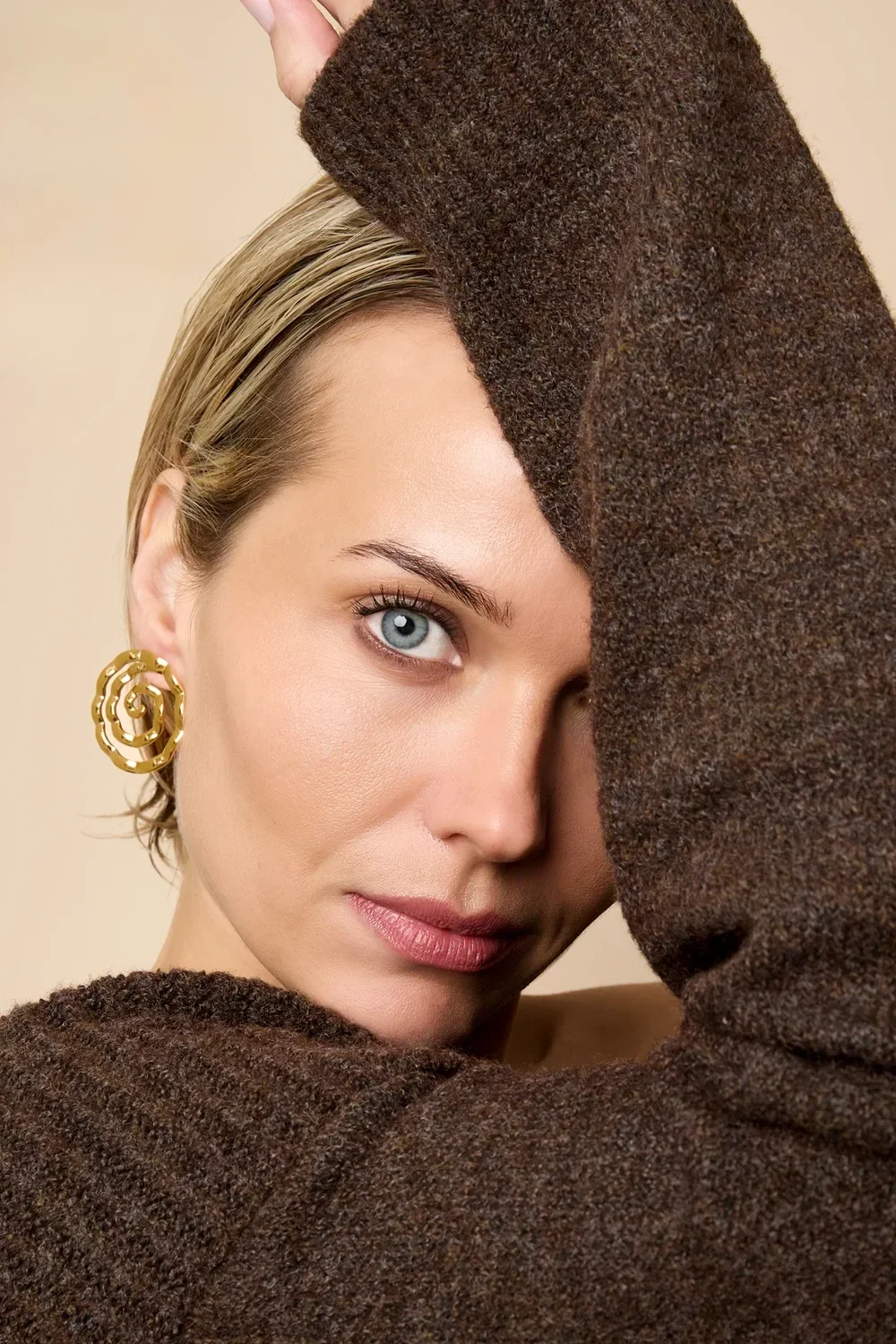 Twister oorbel - goud