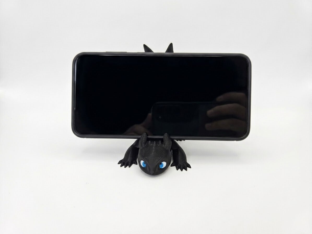 Stojak na telefon 3D z motywem "Szczerbatka"