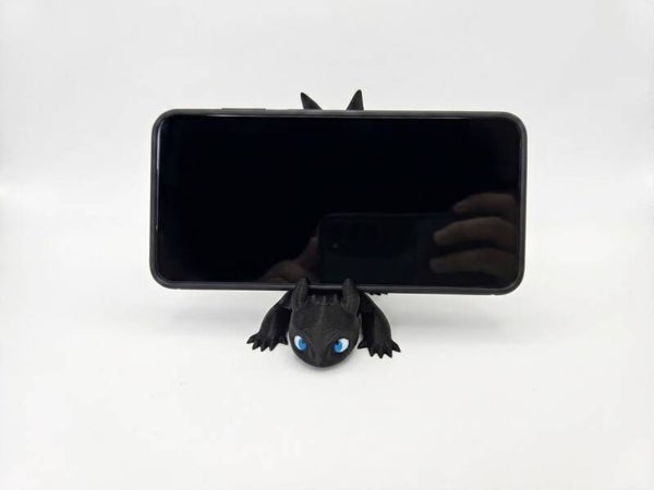 Stojak na telefon 3D z motywem "Szczerbatka"