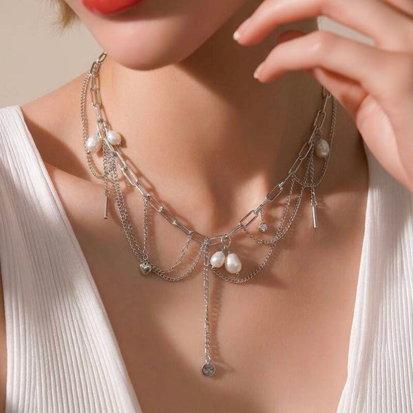 Håndlavet unika-halskæde i 925 sterlingsølv med guldsmed, hjerte og perle | Silver Saga