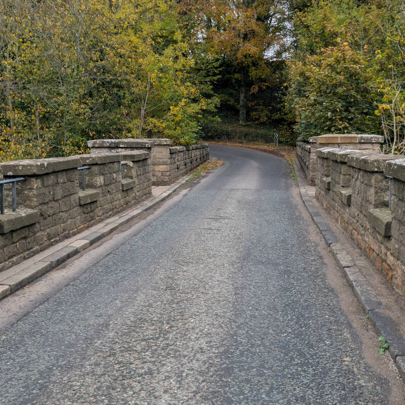 The narrow road crossing historic Abbey Bridge over the River Tees, near Egglestone Abbey and Barnard Castle.