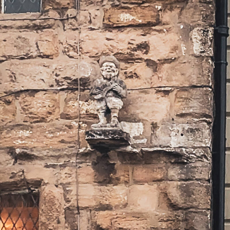 tone figure above the entrance to Blagraves House on The Bank in Barnard Castle.