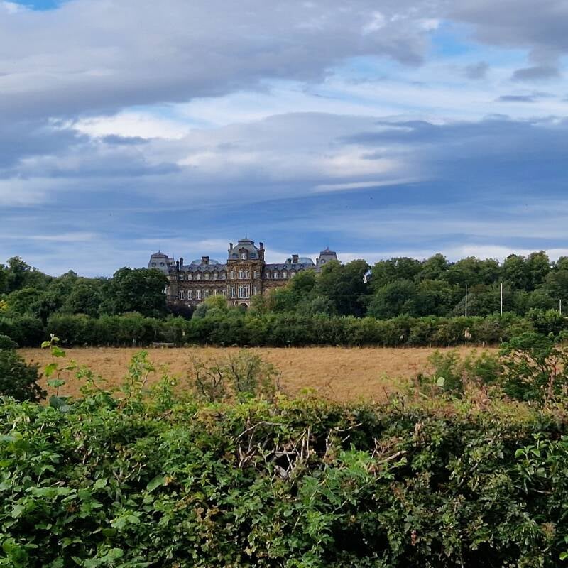 The Bowes Museum seen across the fields from the Lendings in Barnard Castle