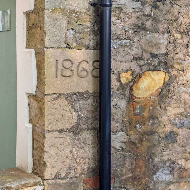 Stone marked 1868 set into later building beside Bowlees chapel in Teesdale