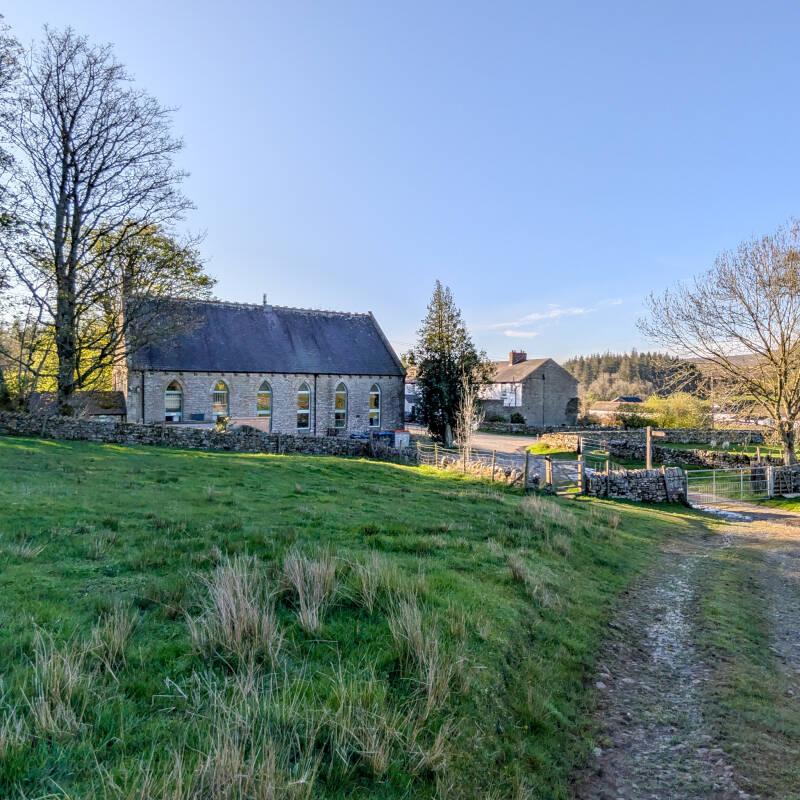 Bowlees Visitor Centre historic chapel building Teesdale from the side with stone walls and rural setting