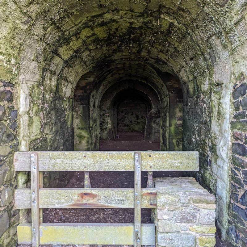 Stone entrance leading into the passages beneath the Castle Point lime kilns on Holy Island