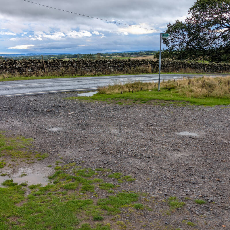 Gravel pull-in parking on Moor Road for the Cotherstone Moor tank wreck walk