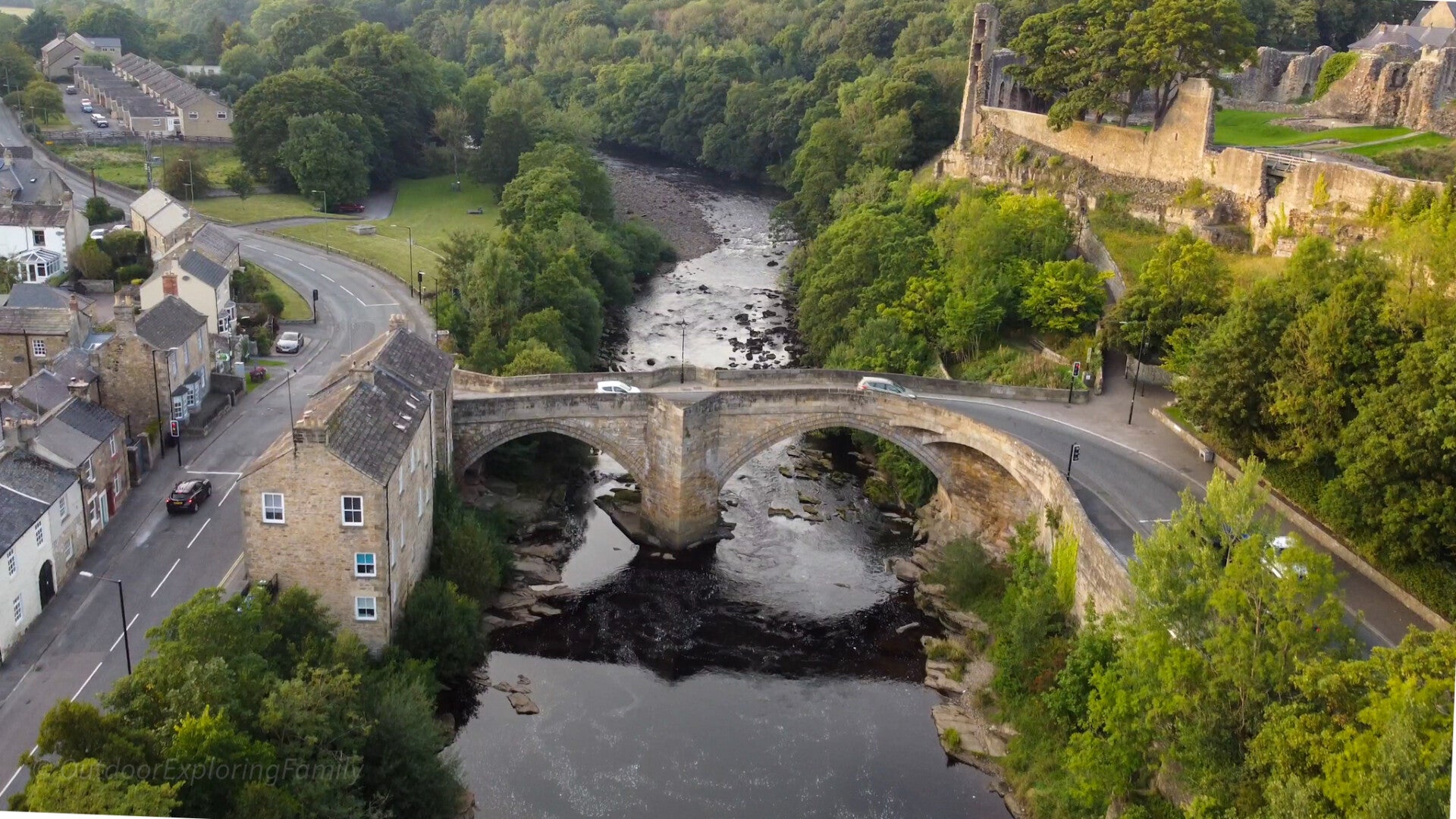 Wide aerial view of County Bridge and the River Tees below Barnard Castle.