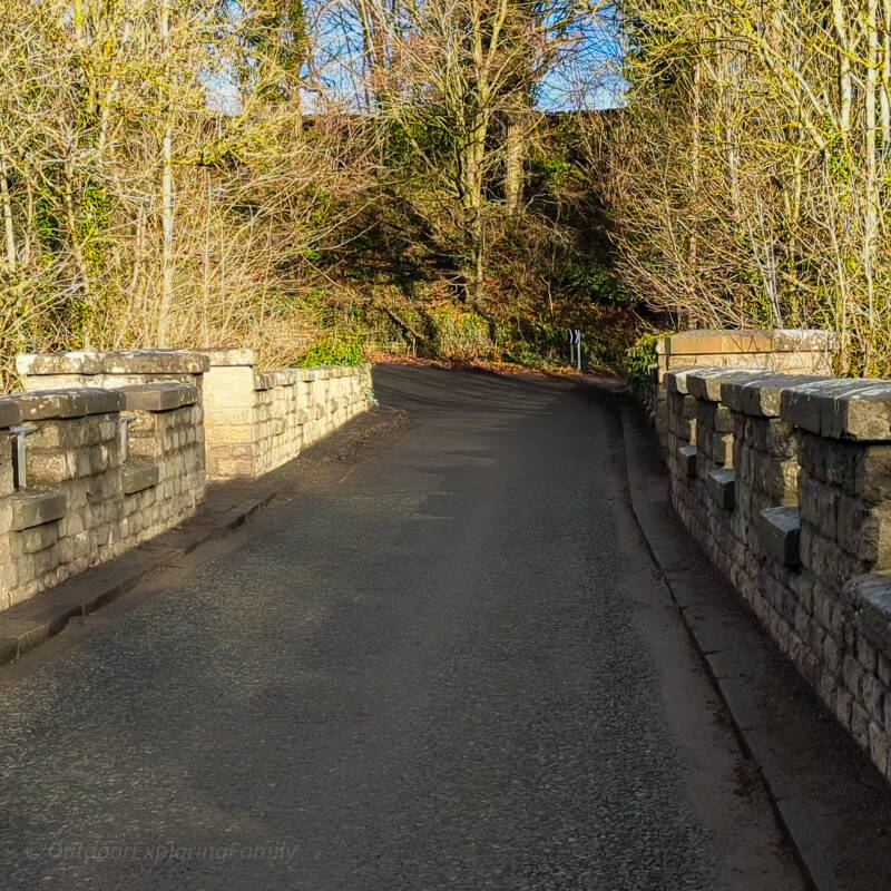 View across Abbey Bridge towards the wooded approach road near Egglestone Abbey in Teesdale.