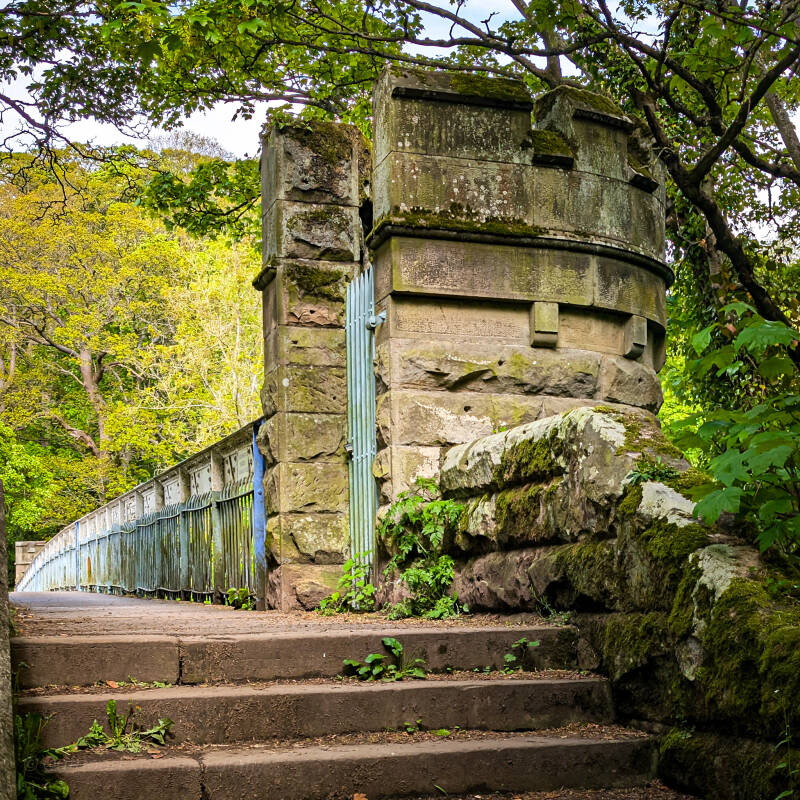 Stone steps and castellated turret entrance to Deepdale Aqueduct, showing the Victorian stonework at the end of the bridge.