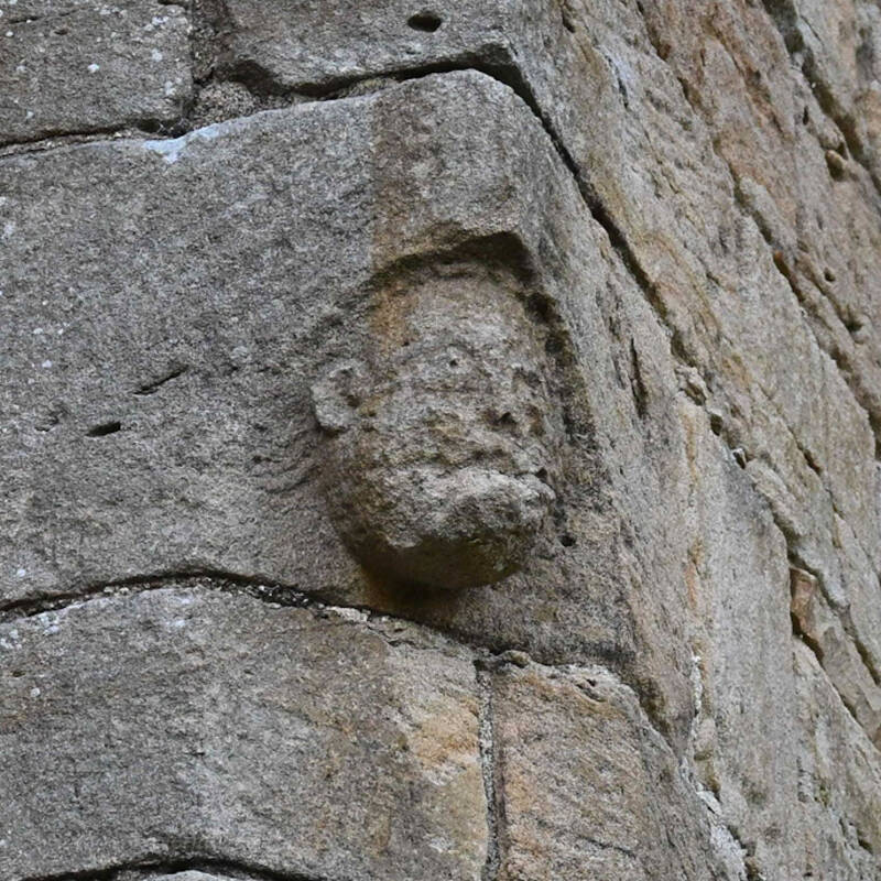 Medieval stone face carving at Egglestone Abbey near Barnard Castle.