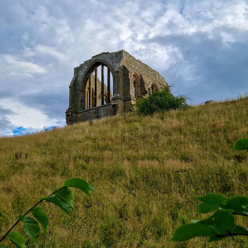 Egglestone Abbey ruins overlooking the fields beside the River Tees