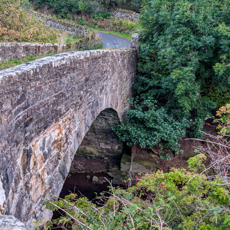 The single stone arch of Hury Mill Bridge over the River Balder in Baldersdale.
