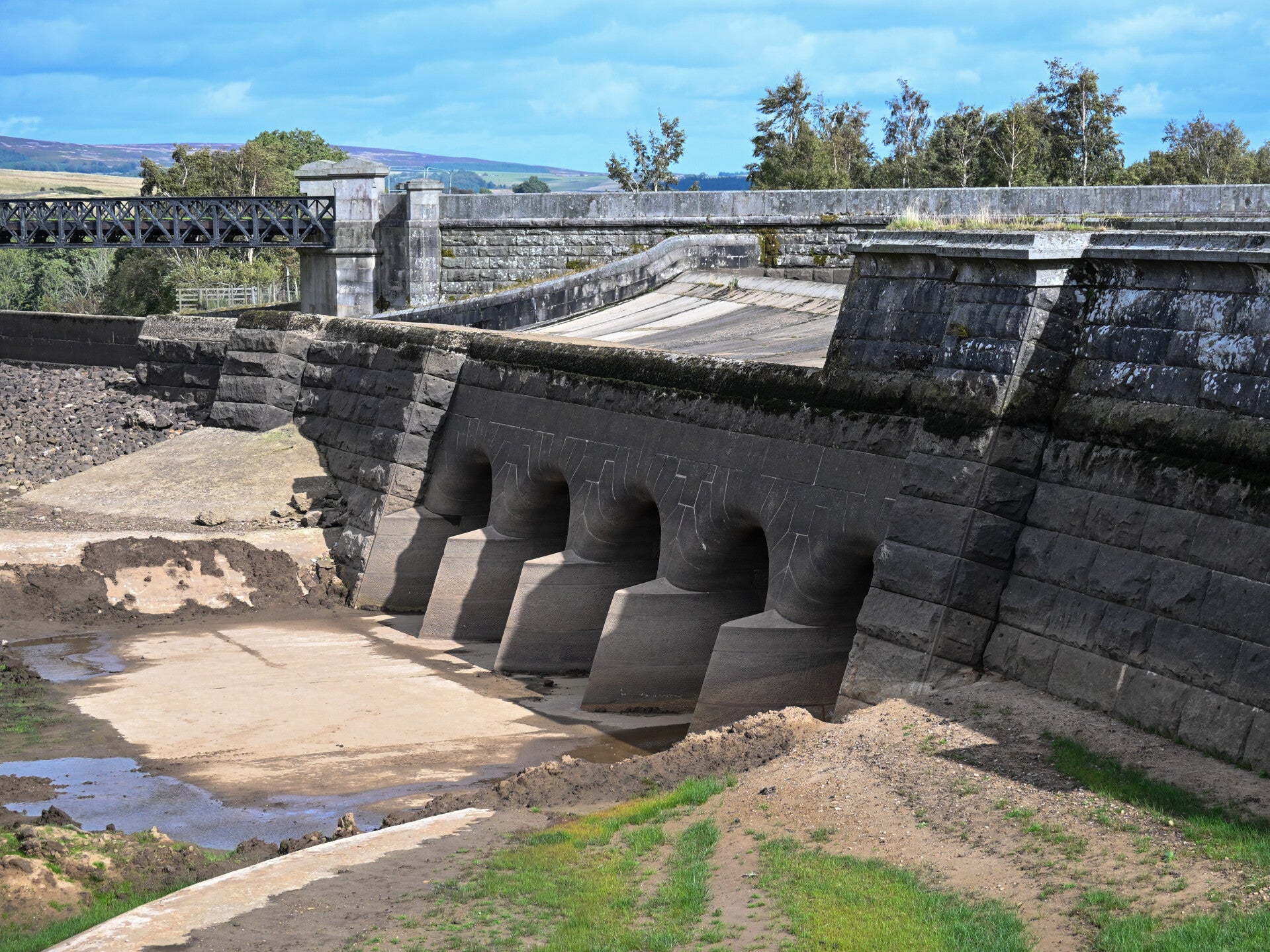 Stone spillway structure at Hury Reservoir exposed during the 2026 drawdown and improvement works