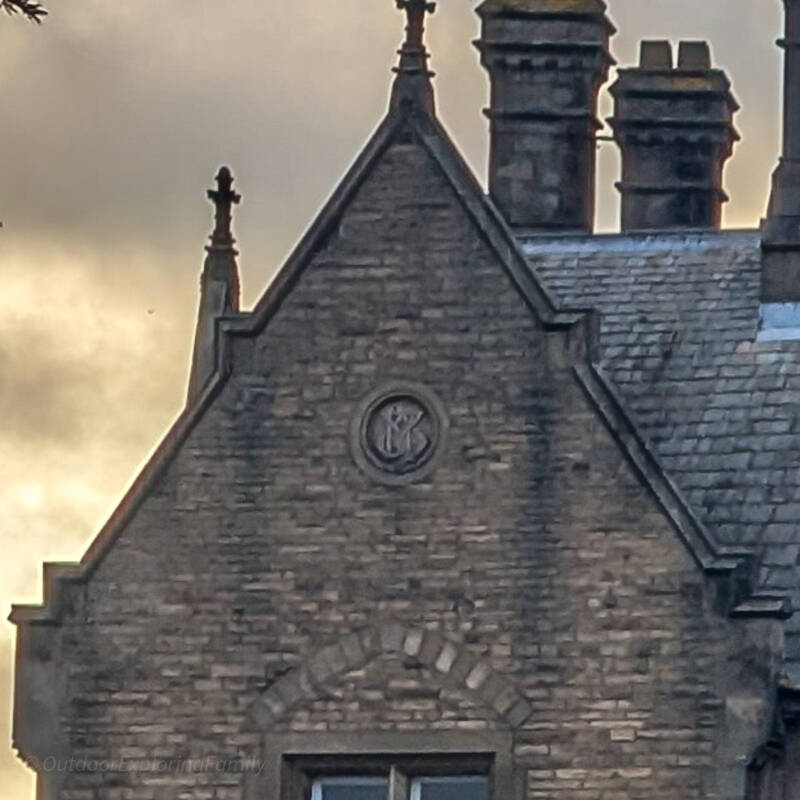Carved JB monogram for Jonathan Backhouse on the former Barclays Bank building in Barnard Castle.
