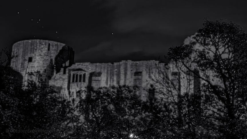 Black and white aerial view of Barnard Castle ruins above the River Tees, linked with the Lady Ann Day White Lady legend.