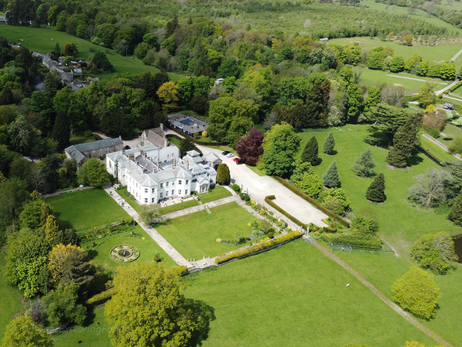 Historic exterior of Lartington Hall near Barnard Castle surrounded by trees and Teesdale countryside