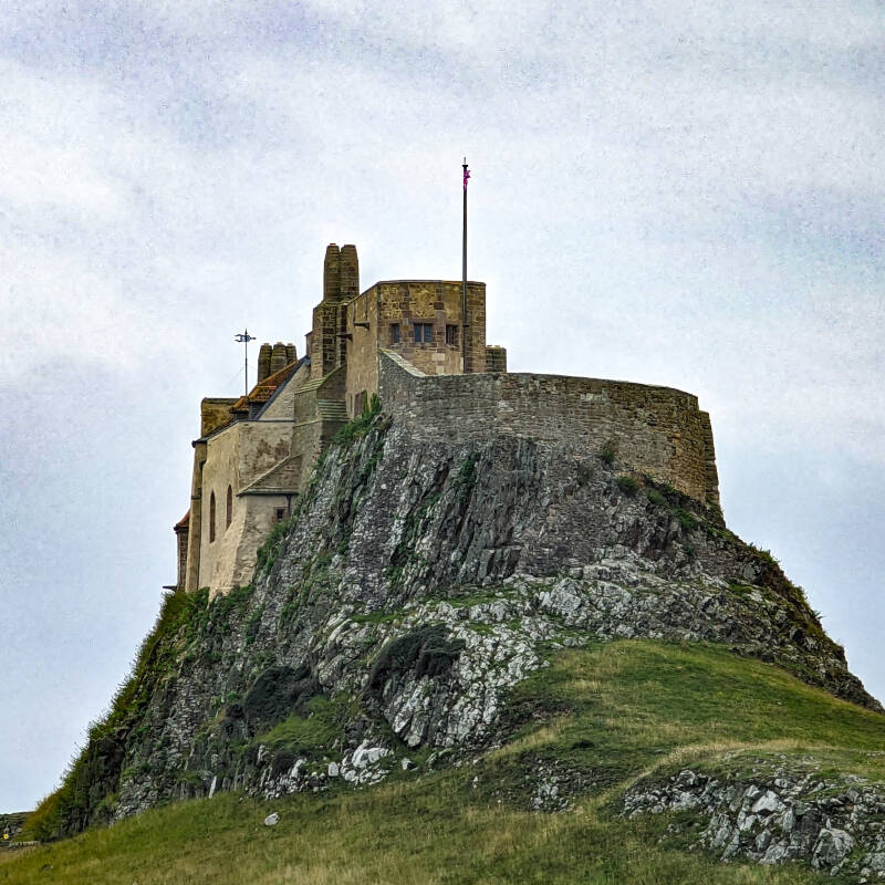 Lindisfarne Castle rising above the rocky crag at Castle Point on Holy Island