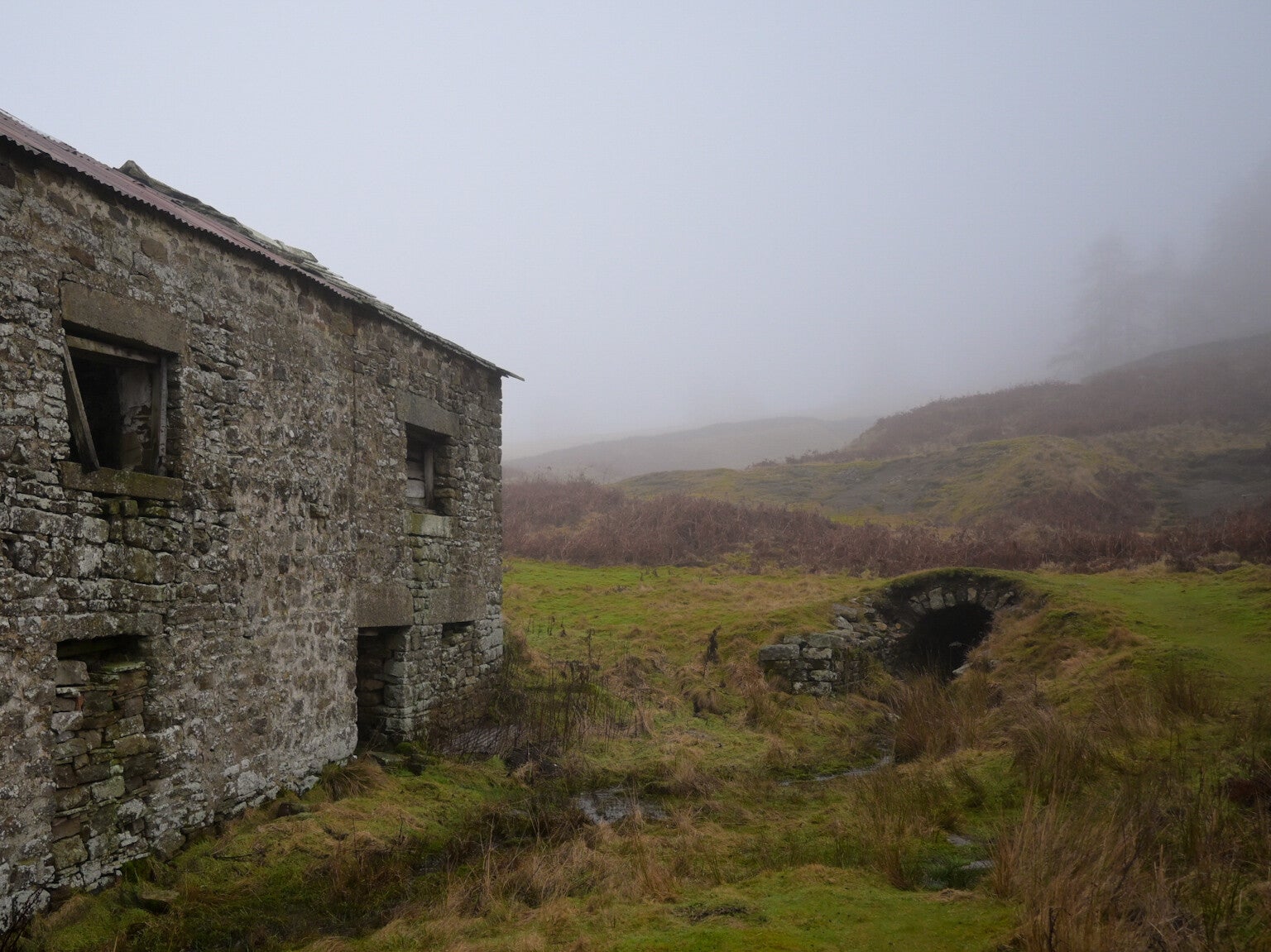 Ruined London Lead Company mine buildings in the Teesdale landscape