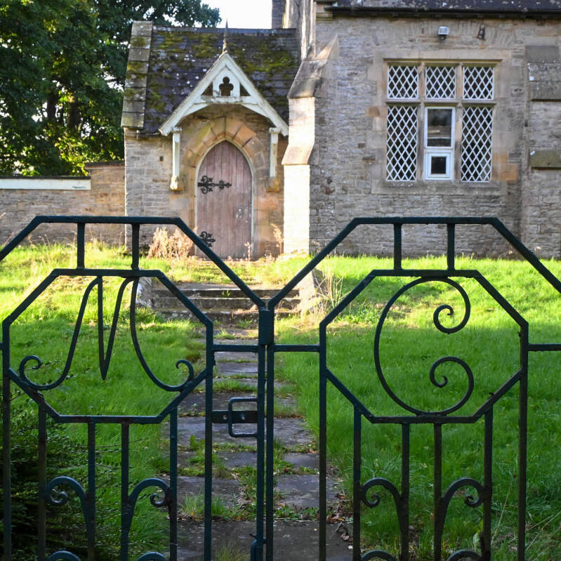 Decorative iron gates and entrance to the former London Lead Company School in Middleton-in-Teesdale