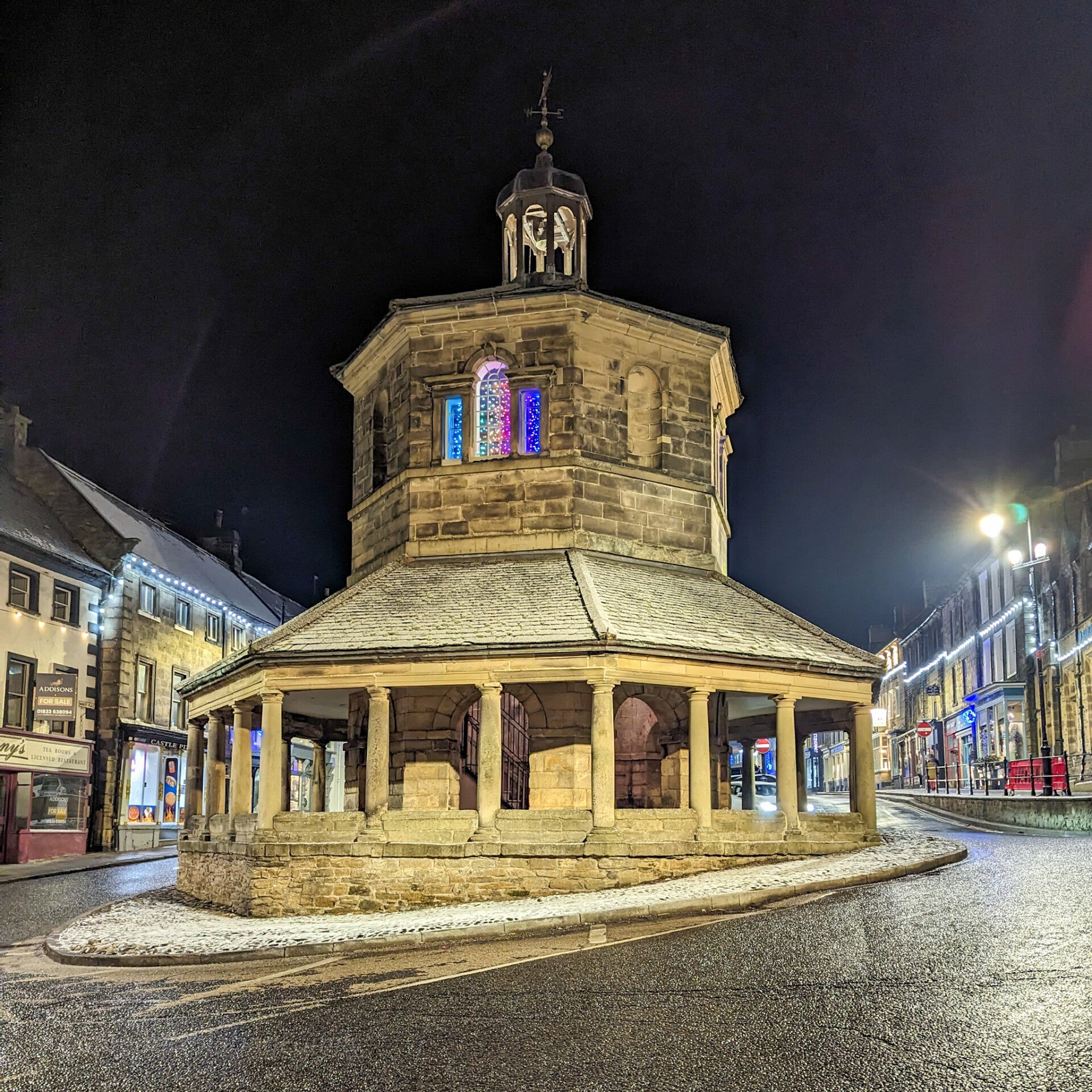 Barnard Castle Market Cross illuminated at night in County Durham