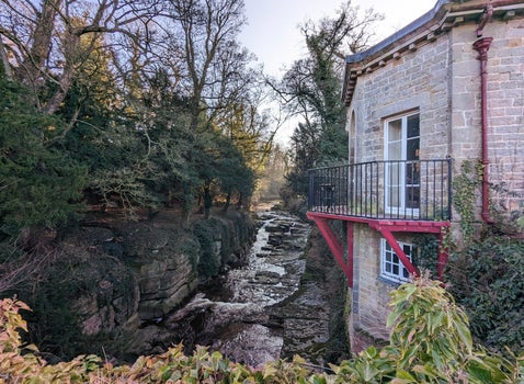 a view looking up the River Greta