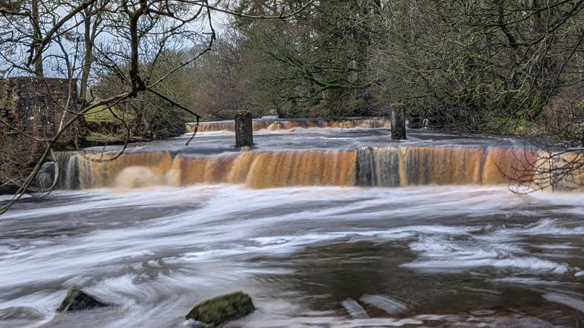 Wide view of Mill Force waterfall near Bowes village