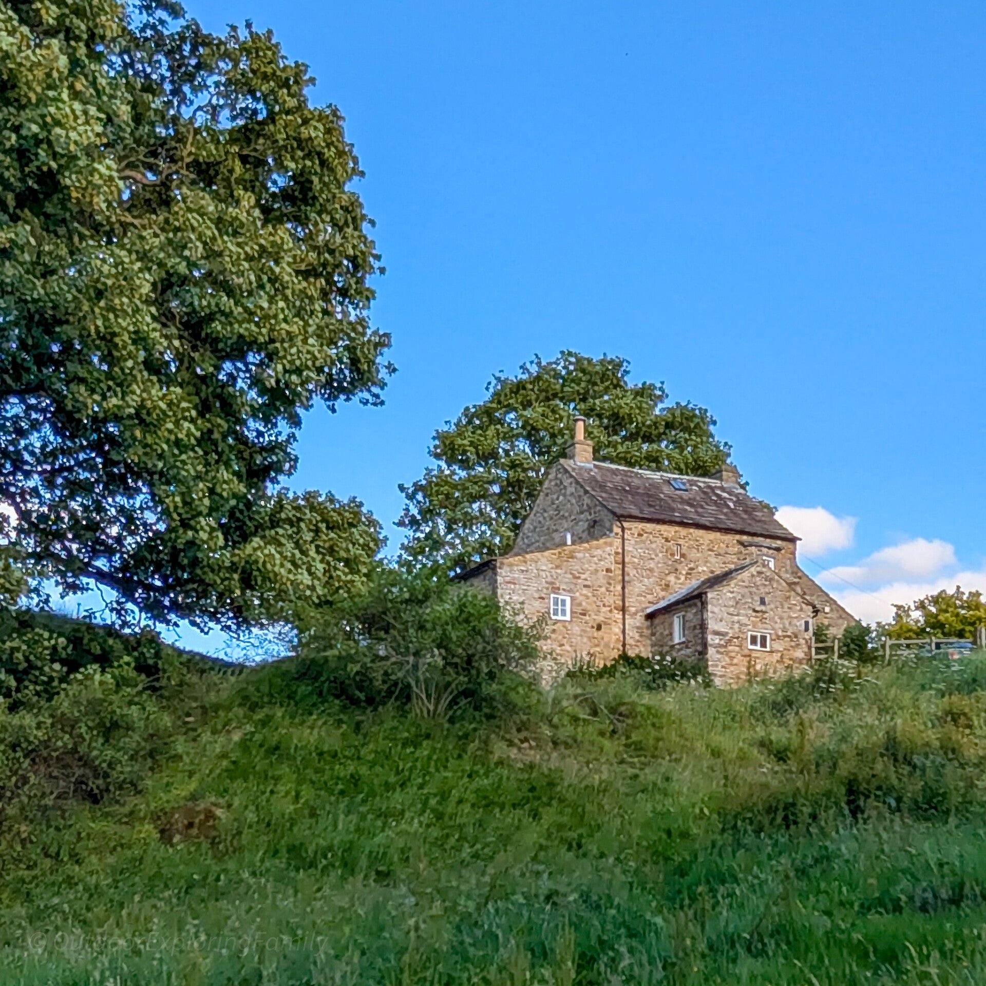 Grade II listed Old Cottage beside Abbey Cottages near Egglestone Abbey on the Thorsgill Wood Walk.