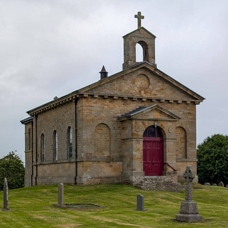 St Mary’s Church at Rokeby with its red door and bellcote beside the A66 in County Durham.