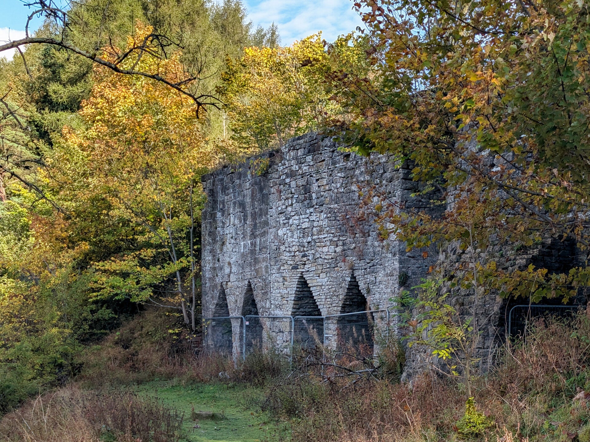 The large stone fronts and draw arches of Skears Lime Kilns in Hudeshope near Middleton-in-Teesdale.