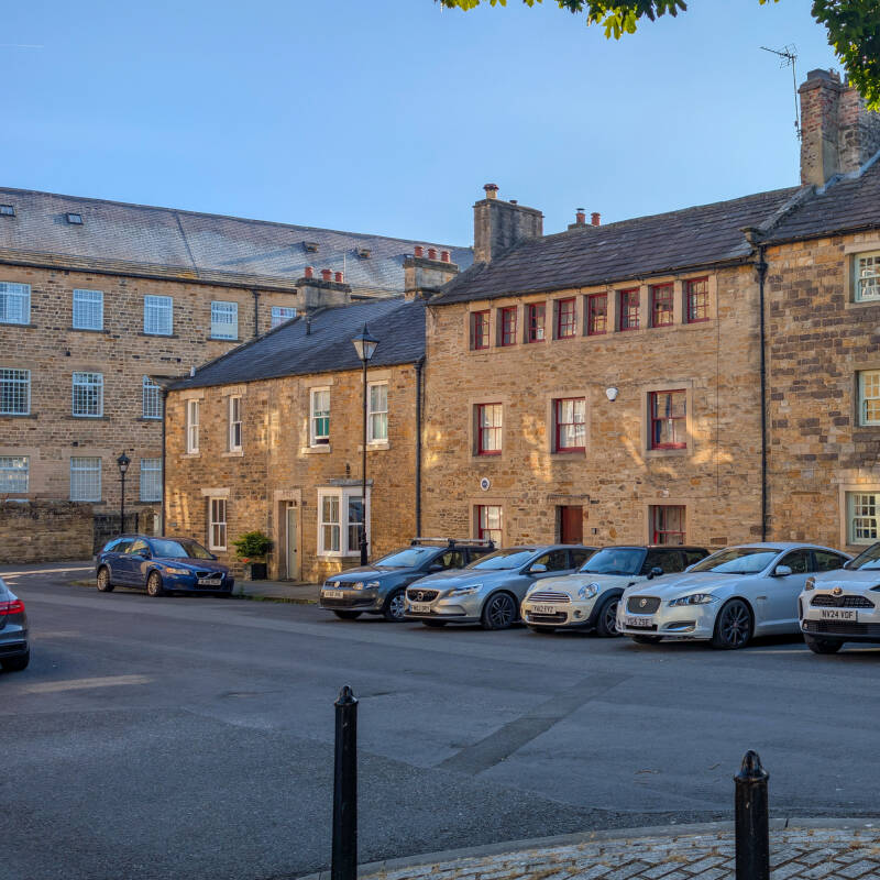 Historic weavers cottages on Thorngate in Barnard Castle with rows of upper windows