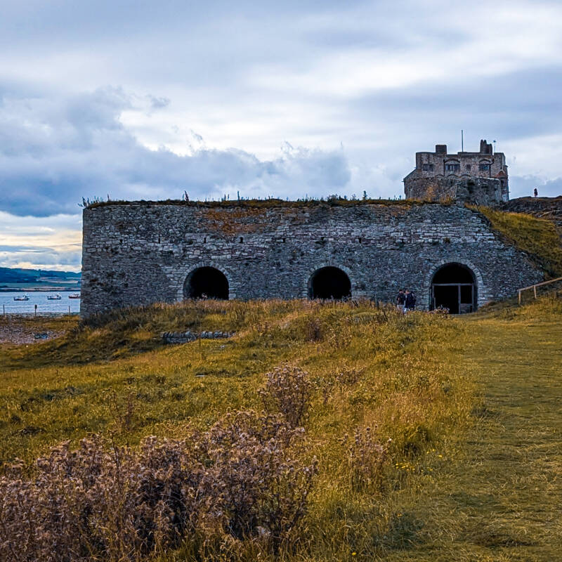 Castle Point lime kilns with Lindisfarne Castle rising behind them on Holy Island