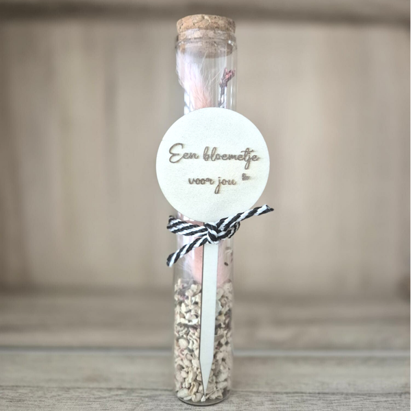 Wensbuisje met bloemenzaadjes en gepersonaliseerde plantensteker