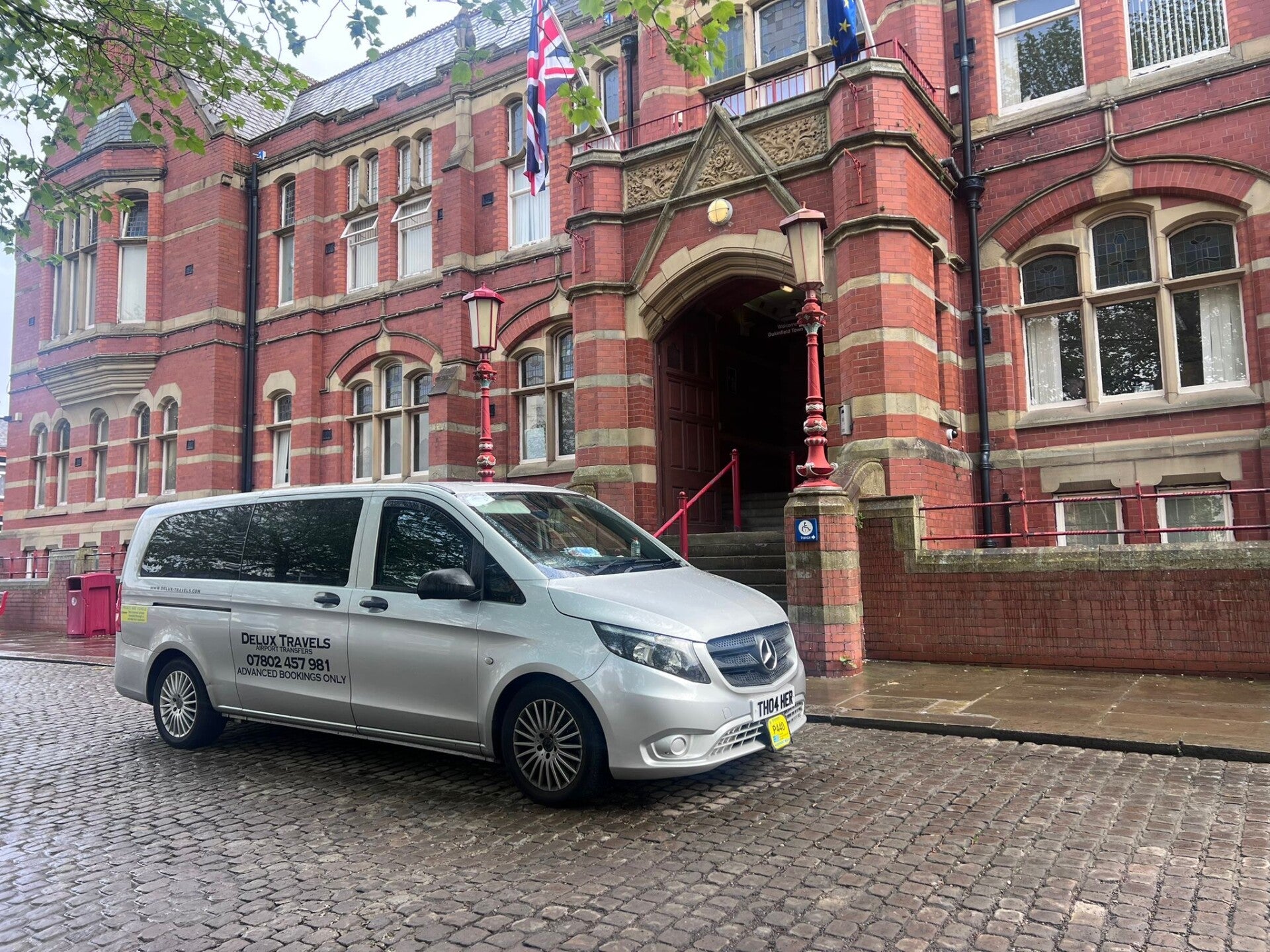 Delux Travels executive transport vehicle
