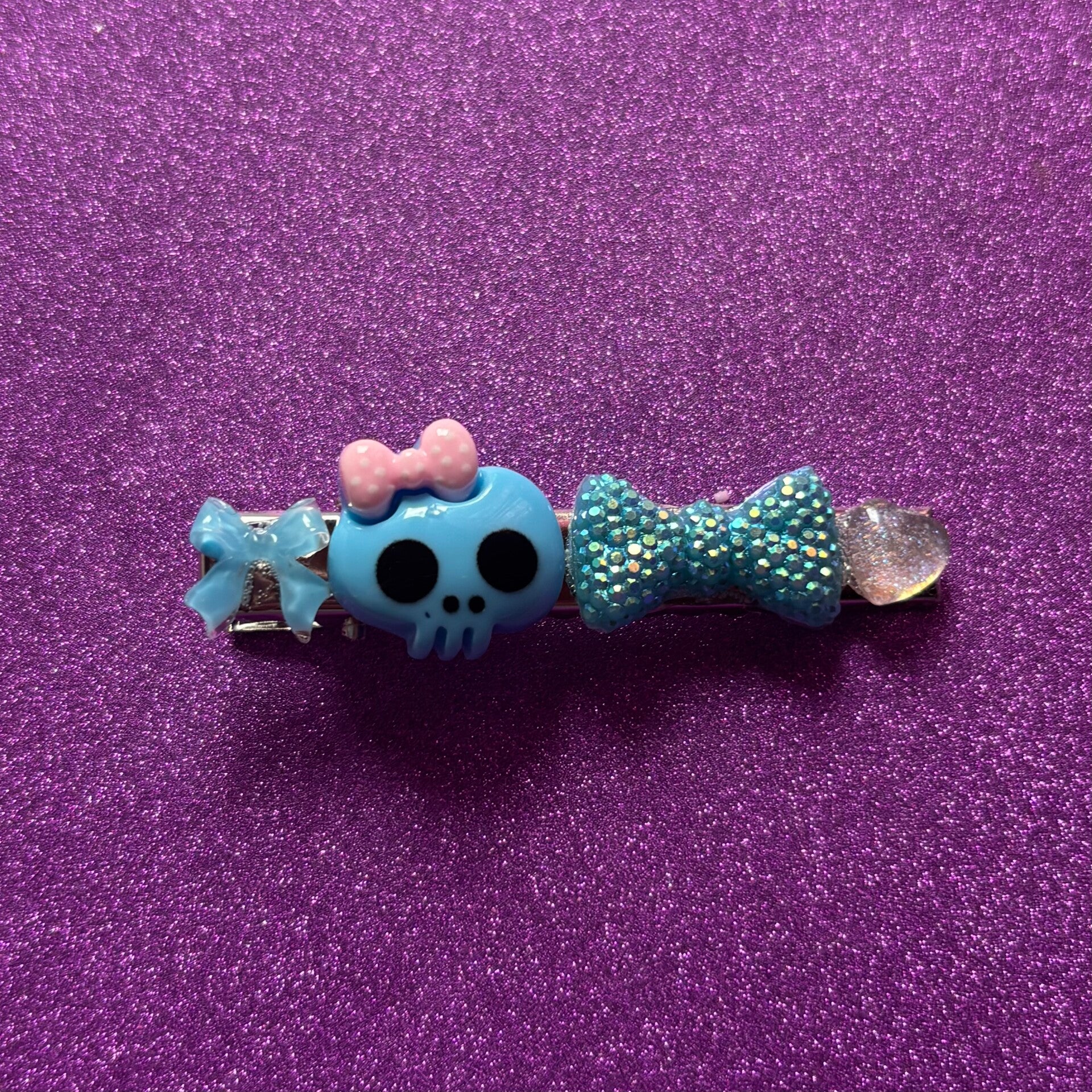 Blue skull and bows silver hair clip