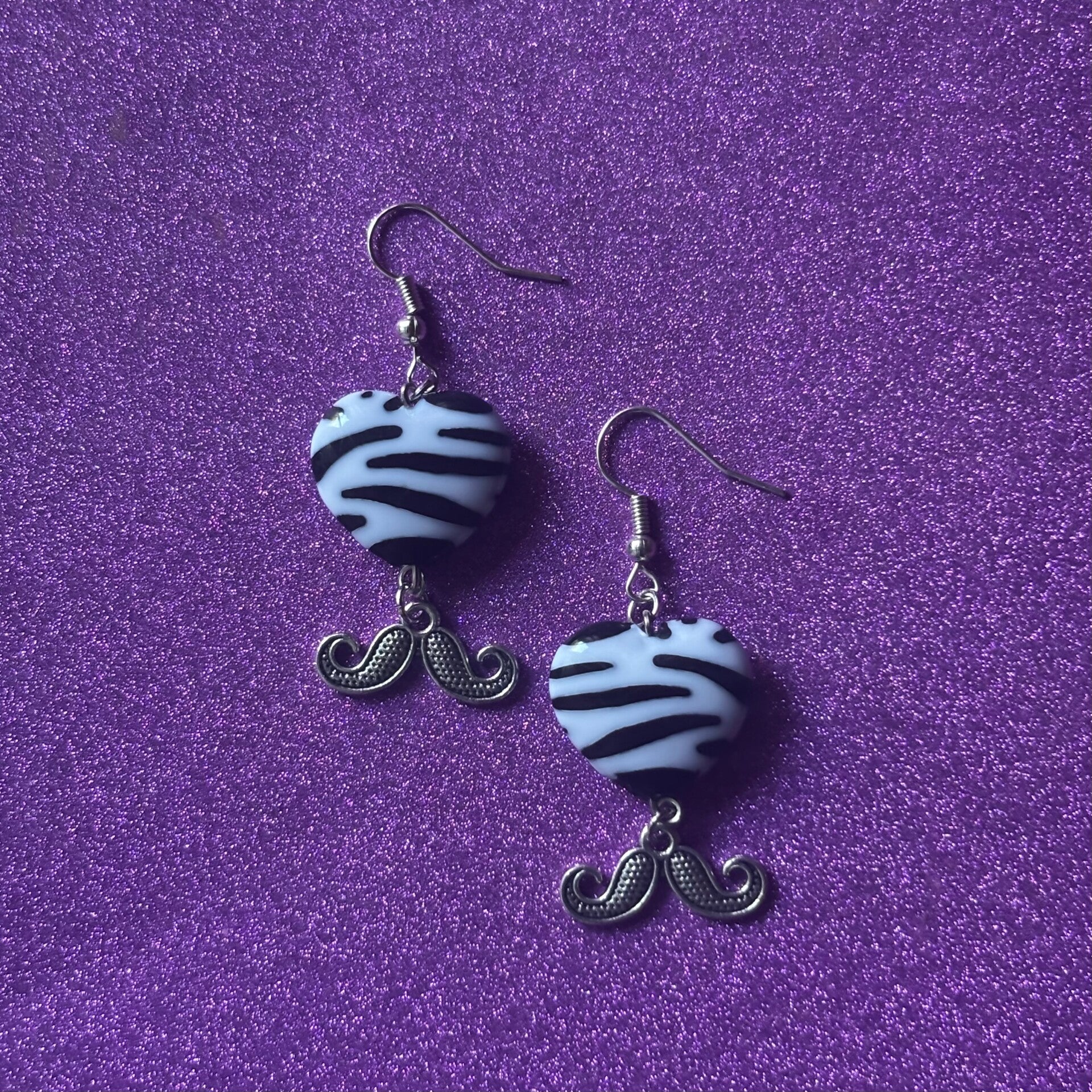 Zebra print silver moustache earrings