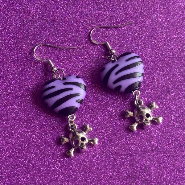 Purple zebra print silver skull earrings