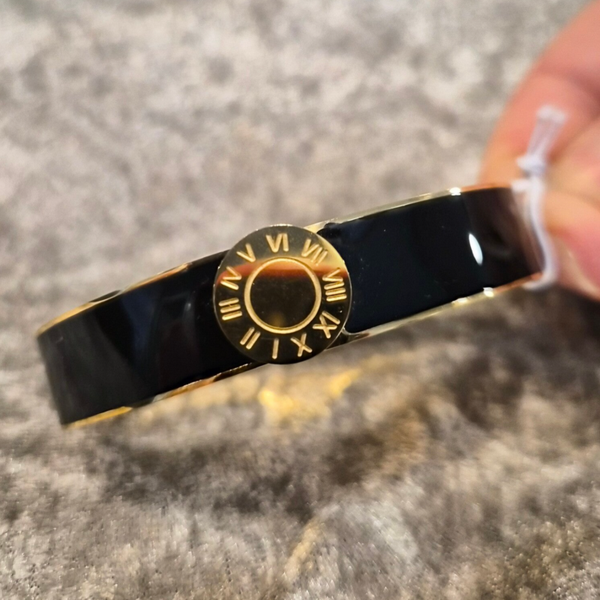 Gull og sort armbånd